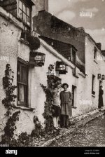 in-early-1920s-birdcages-were-often-hung-outside-houses-in-cobh-in-county-cork-ireland-origina...jpg